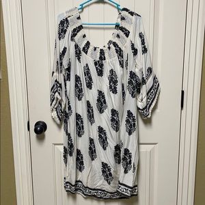 Off shoulder cream and black dress